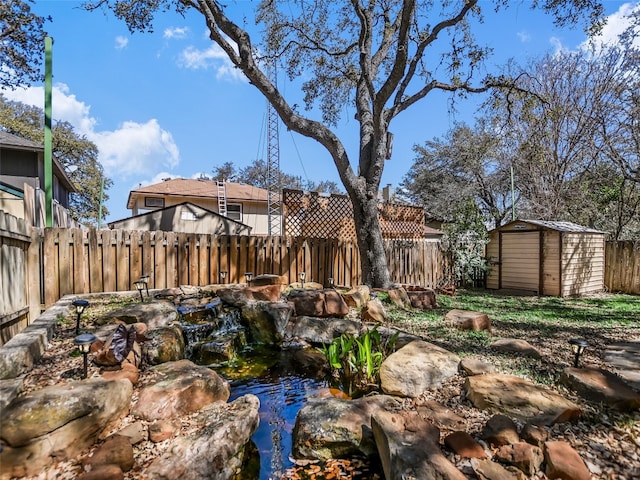 716 Shiny Rock Dr, Austin, TX 78748 - fenced backyard featuring a small pond