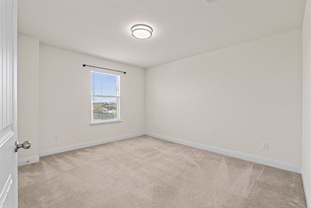 12923 Dwight Eisenhower St, Manor, TX 78653 - unfurnished room featuring light colored carpet and baseboards
