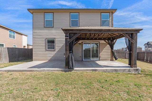 12923 Dwight Eisenhower St, Manor, TX 78653 - back of house featuring a patio