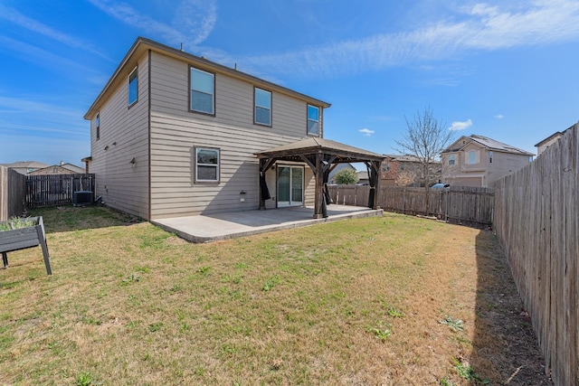 12923 Dwight Eisenhower St, Manor, TX 78653 - back of property featuring a gazebo, cooling unit, and a patio area