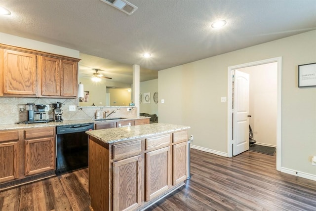 6806 Ambrose Cir, Temple, TX 76502 - kitchen featuring visible vents, dark wood-style flooring, black dishwasher, and a sink
