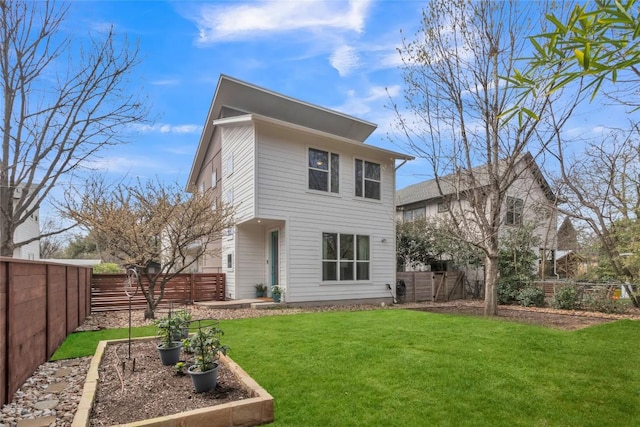 402 Irma Dr Unit B, Austin, TX 78752 - rear view of property with a garden