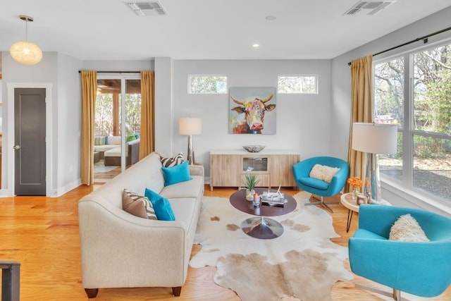 402 Irma Dr Unit B, Austin, TX 78752 - living room featuring wood finished floors and recessed lighting