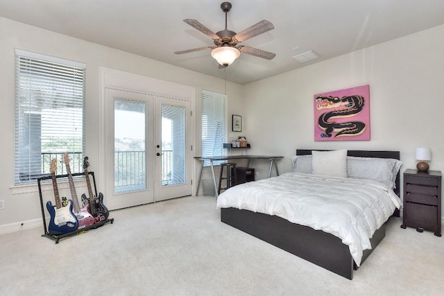 bedroom featuring carpet, visible vents, access to outside, and french doors