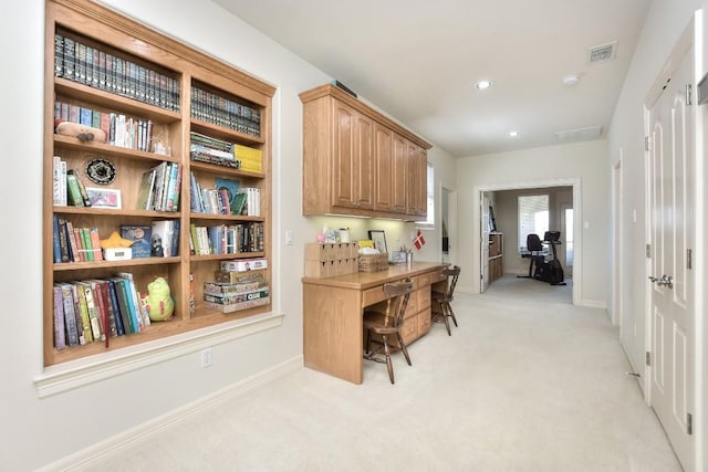 office space with recessed lighting, visible vents, baseboards, and light carpet