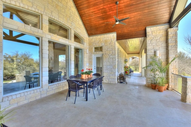view of patio featuring outdoor dining space and ceiling fan