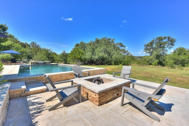 view of patio / terrace with an outdoor pool and an outdoor fire pit