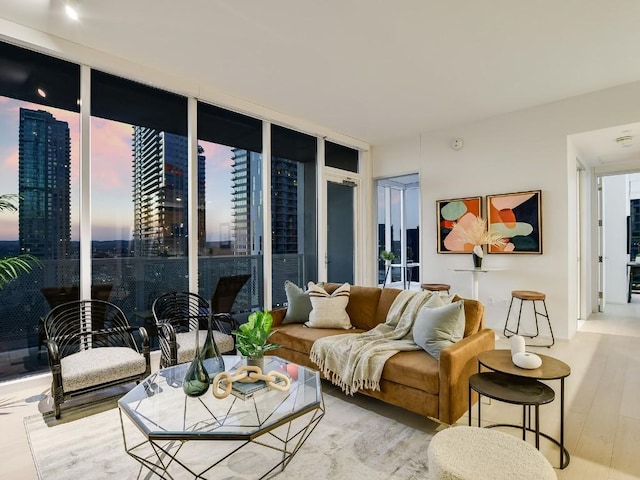 301 W Ave Unit 1301, Austin, TX 78701 - living room with floor to ceiling windows, wood finished floors, and a city view