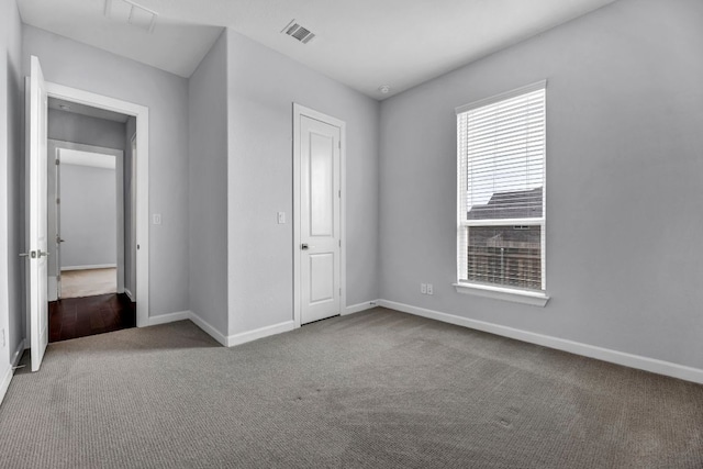 252 Sabino Dr, Buda, TX 78610 - unfurnished bedroom with carpet floors and baseboards