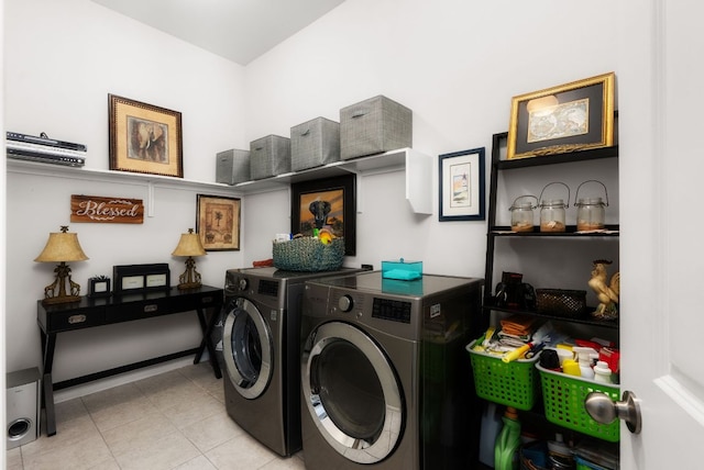 519 Tanda Ln, Hutto, TX 78634 - laundry room featuring separate washer and dryer and tile patterned flooring