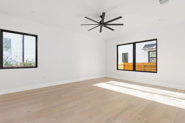802 Philco Dr Unit 1, Austin, TX 78745 - spare room with light wood-style floors and ceiling fan
