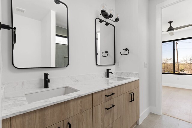 802 Philco Dr Unit 1, Austin, TX 78745 - full bathroom featuring double vanity and tile patterned flooring