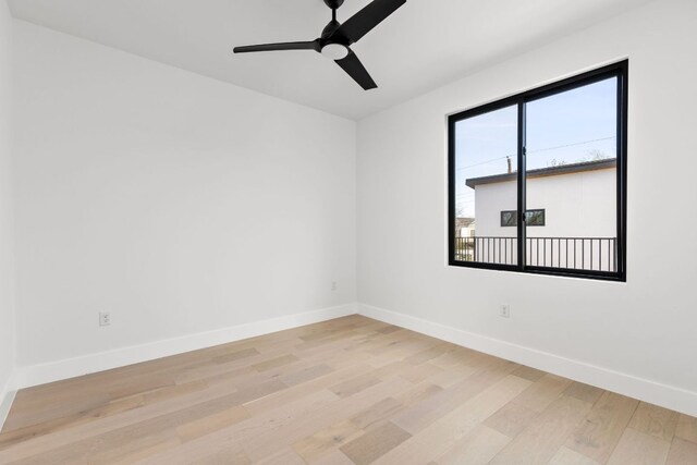 802 Philco Dr Unit 1, Austin, TX 78745 - unfurnished room featuring light wood finished floors and ceiling fan