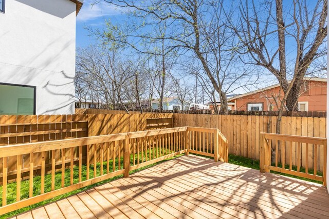 802 Philco Dr Unit 1, Austin, TX 78745 - wooden deck with a fenced backyard