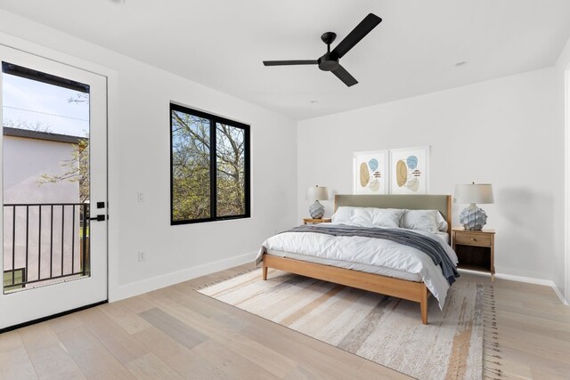 802 Philco Dr Unit 1, Austin, TX 78745 - bedroom featuring light wood finished floors, access to exterior, and a ceiling fan