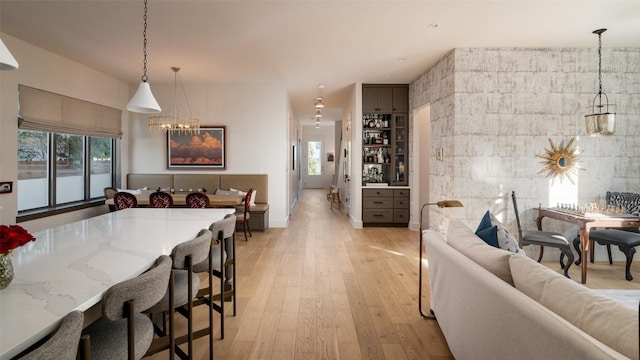4408 Jinx Ave Unit 1, Austin, TX 78745 - dining area featuring light wood-type flooring and a chandelier