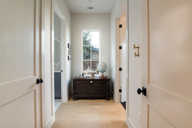 4408 Jinx Ave Unit 1, Austin, TX 78745 - corridor featuring light wood-style floors and baseboards