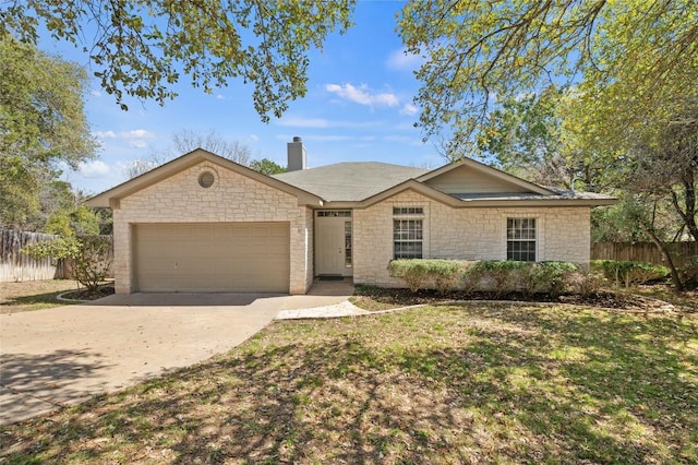 5709 Hudson Bend Rd, Austin, TX 78734 - ranch-style house featuring an attached garage, concrete driveway, and a chimney