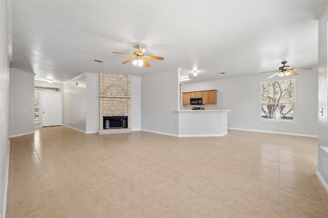5709 Hudson Bend Rd, Austin, TX 78734 - unfurnished living room with a ceiling fan, a fireplace, and light tile patterned flooring