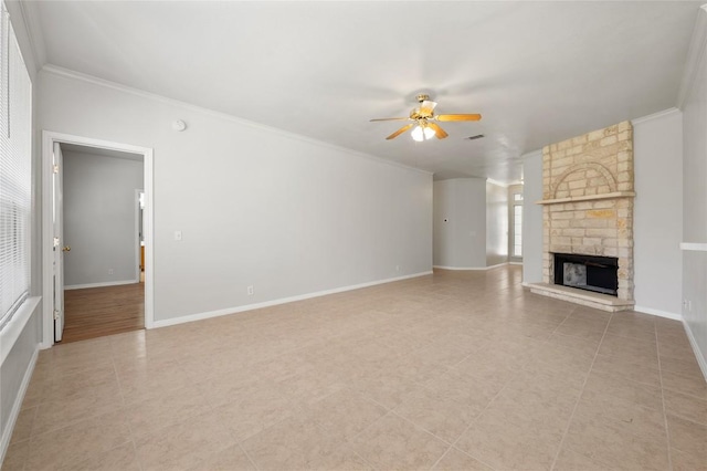 5709 Hudson Bend Rd, Austin, TX 78734 - unfurnished living room featuring a ceiling fan, ornamental molding, light tile patterned floors, and a fireplace