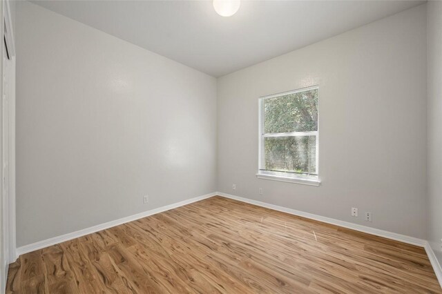 5709 Hudson Bend Rd, Austin, TX 78734 - spare room featuring light wood-type flooring and baseboards