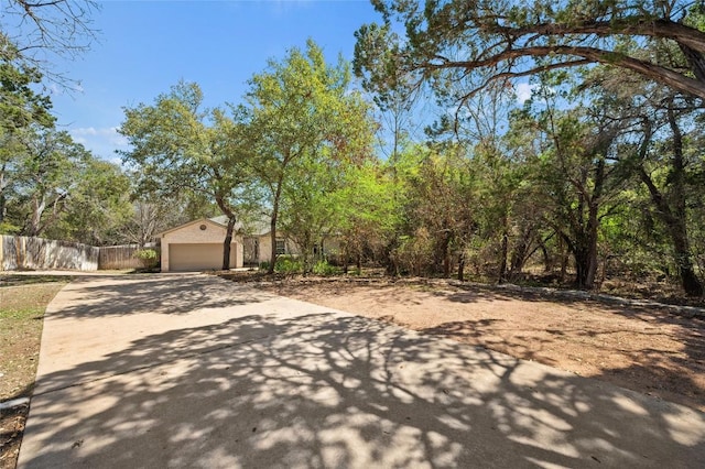 5709 Hudson Bend Rd, Austin, TX 78734 - view of front of property featuring driveway and an attached garage