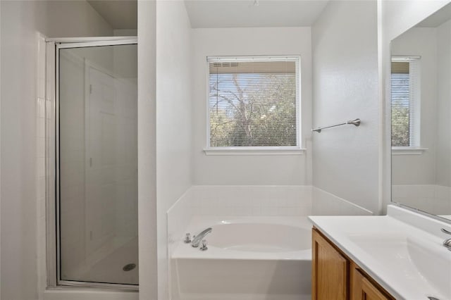 5709 Hudson Bend Rd, Austin, TX 78734 - full bathroom with a shower stall, a garden tub, and vanity