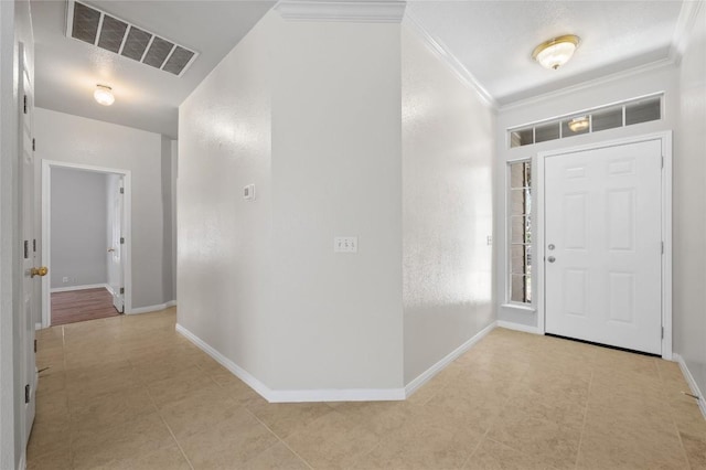 5709 Hudson Bend Rd, Austin, TX 78734 - foyer entrance featuring crown molding and light tile patterned flooring