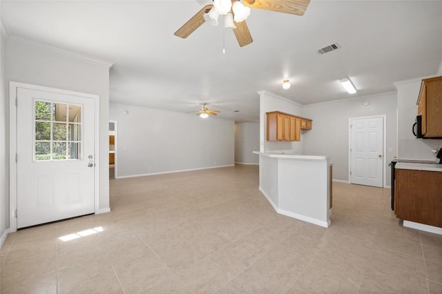 5709 Hudson Bend Rd, Austin, TX 78734 - kitchen featuring ceiling fan, light countertops, ornamental molding, black microwave, and open floor plan