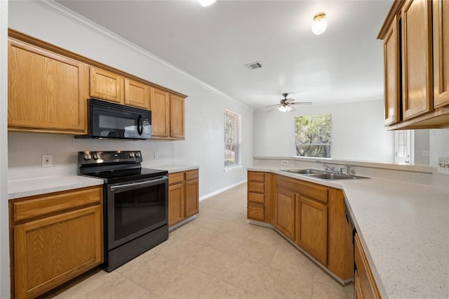 5709 Hudson Bend Rd, Austin, TX 78734 - kitchen featuring black appliances, crown molding, light countertops, brown cabinetry, and a ceiling fan