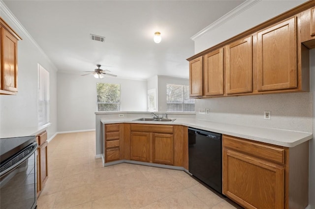5709 Hudson Bend Rd, Austin, TX 78734 - kitchen featuring black dishwasher, stainless steel range, ceiling fan, light countertops, and a peninsula