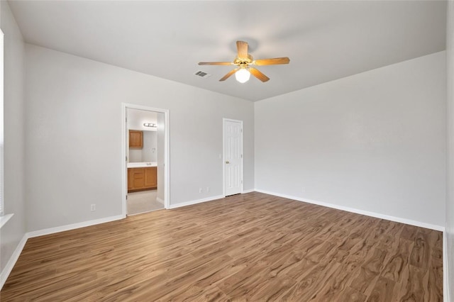 5709 Hudson Bend Rd, Austin, TX 78734 - unfurnished bedroom with light wood-type flooring, ensuite bathroom, ceiling fan, and a closet