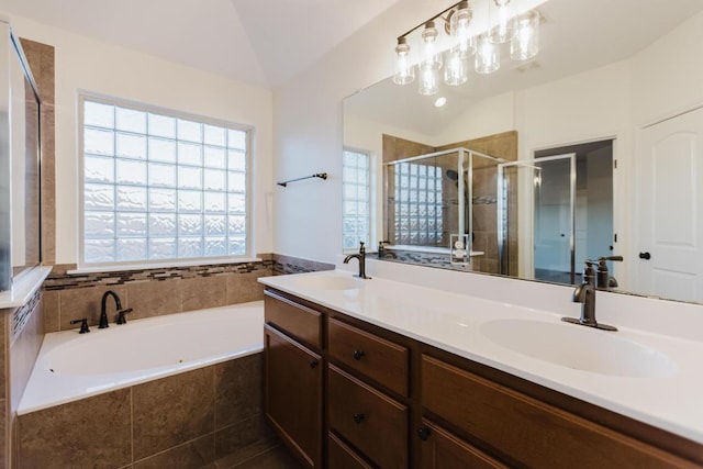 422 Village Commons Blvd, Georgetown, TX 78633 - bathroom featuring a garden tub, a shower stall, double vanity, and lofted ceiling