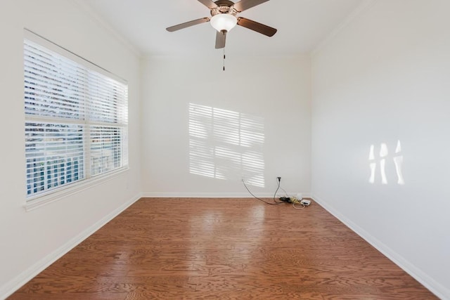 422 Village Commons Blvd, Georgetown, TX 78633 - unfurnished room with crown molding, wood finished floors, baseboards, and a ceiling fan