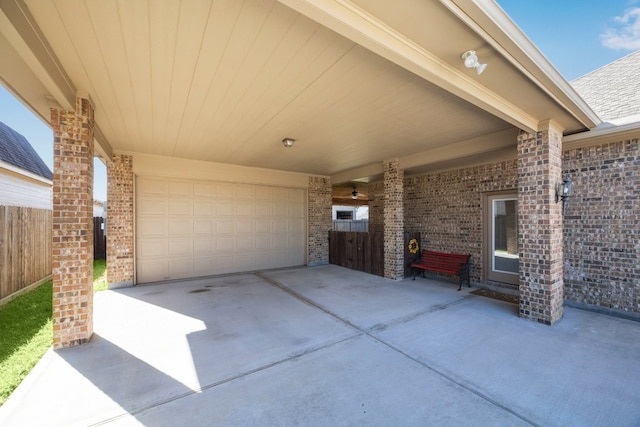 2502 Grey Kirby Dr, League City, TX 77573 - view of patio with concrete driveway and a carport