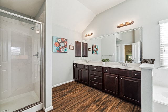 2502 Grey Kirby Dr, League City, TX 77573 - full bath with a stall shower, double vanity, wood finished floors, plenty of natural light, and lofted ceiling