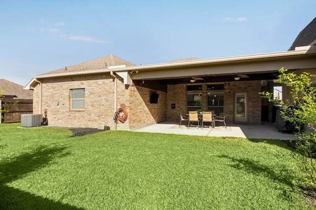 2502 Grey Kirby Dr, League City, TX 77573 - back of property with central air condition unit, brick siding, a ceiling fan, and a patio area