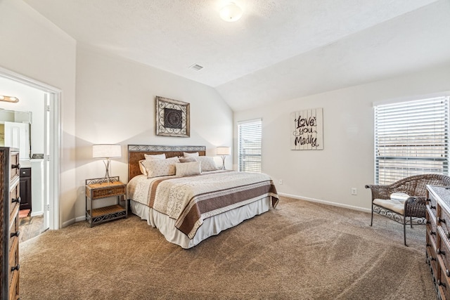 2502 Grey Kirby Dr, League City, TX 77573 - bedroom featuring carpet flooring, baseboards, vaulted ceiling, and ensuite bath
