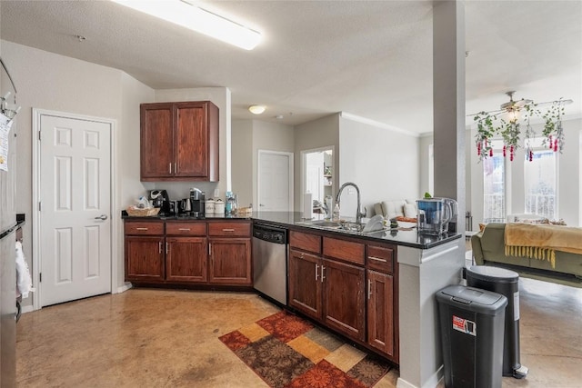 kitchen featuring concrete flooring, dishwasher, a sink, and dark countertops