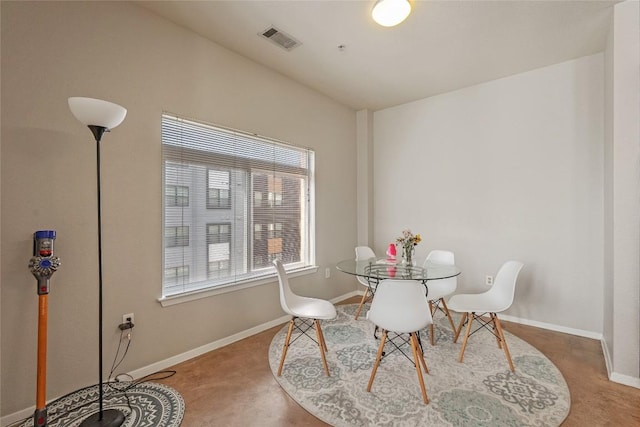 dining area with visible vents and baseboards