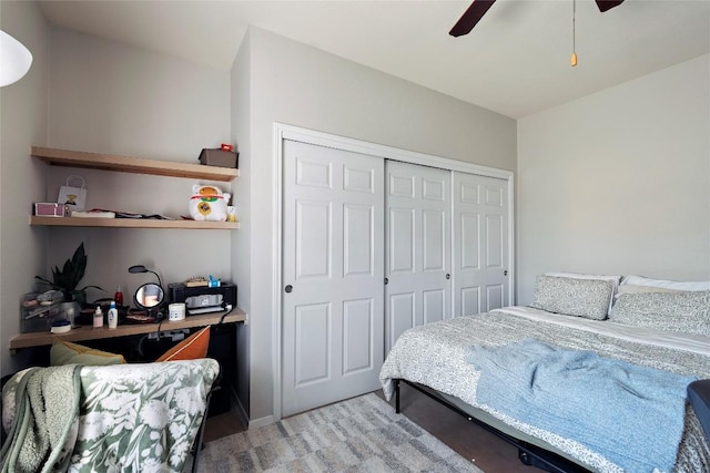 bedroom featuring a closet and a ceiling fan