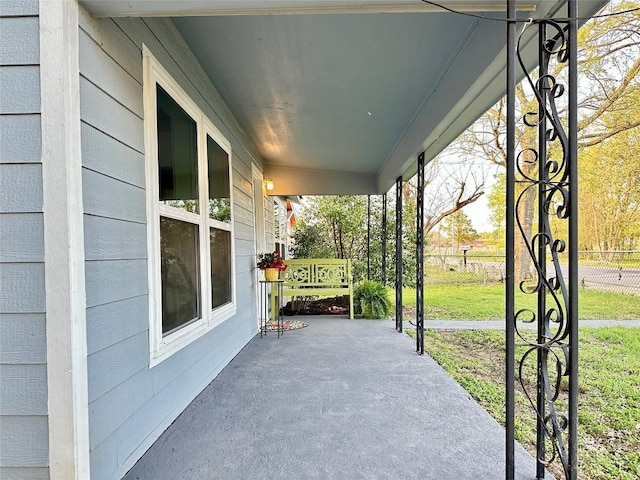 view of patio / terrace featuring fence