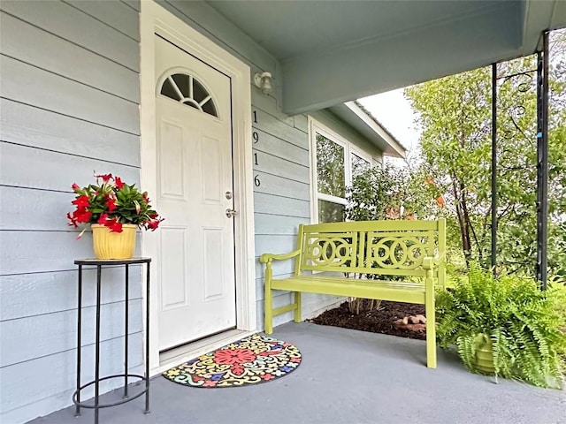 entrance to property with a porch