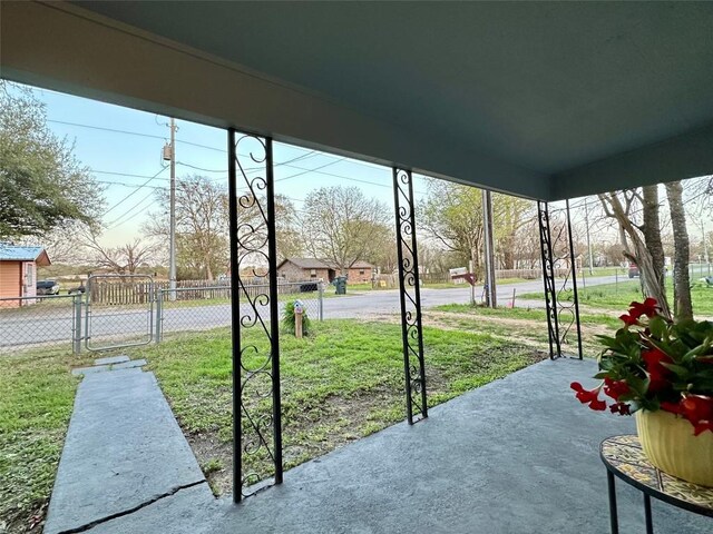 exterior space with a gate and fence
