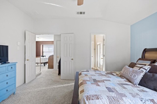 1631 Plume Grass Pl, Round Rock, TX 78665 - bedroom featuring light colored carpet, lofted ceiling, and ceiling fan