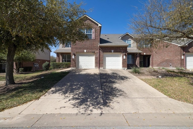 101 Verde Ranch Loop, Leander, TX 78641 - view of front facade with brick siding, driveway, a front yard, and a shingled roof