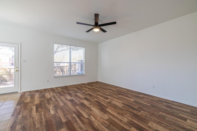 101 Verde Ranch Loop, Leander, TX 78641 - spare room with wood finished floors, ceiling fan, and baseboards