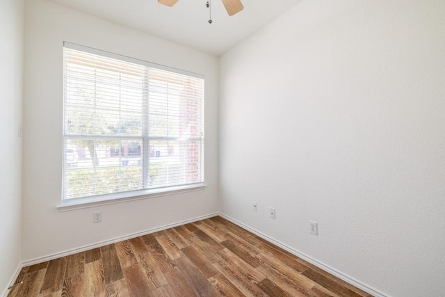 101 Verde Ranch Loop, Leander, TX 78641 - unfurnished room featuring wood finished floors, a ceiling fan, and baseboards
