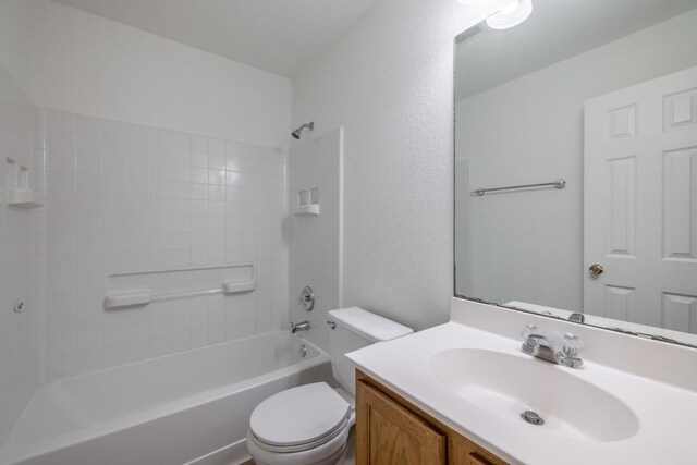 101 Verde Ranch Loop, Leander, TX 78641 - bathroom featuring toilet, vanity, and shower / bathtub combination