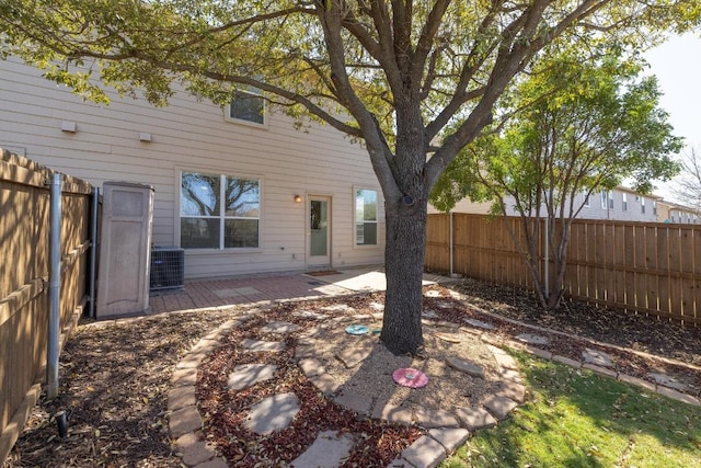 101 Verde Ranch Loop, Leander, TX 78641 - rear view of property with a fenced backyard and cooling unit